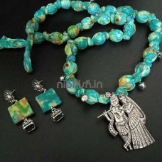 Fabric jewellery set with Radha Krishna pendant