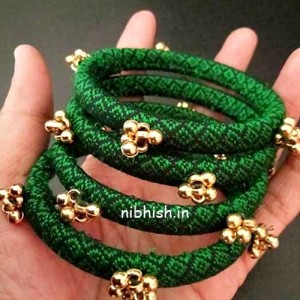 Khan fabric bangles in traditional green color Khan fabric bangles in traditional green color